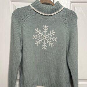 Light blue women’s knit snowflake sweater